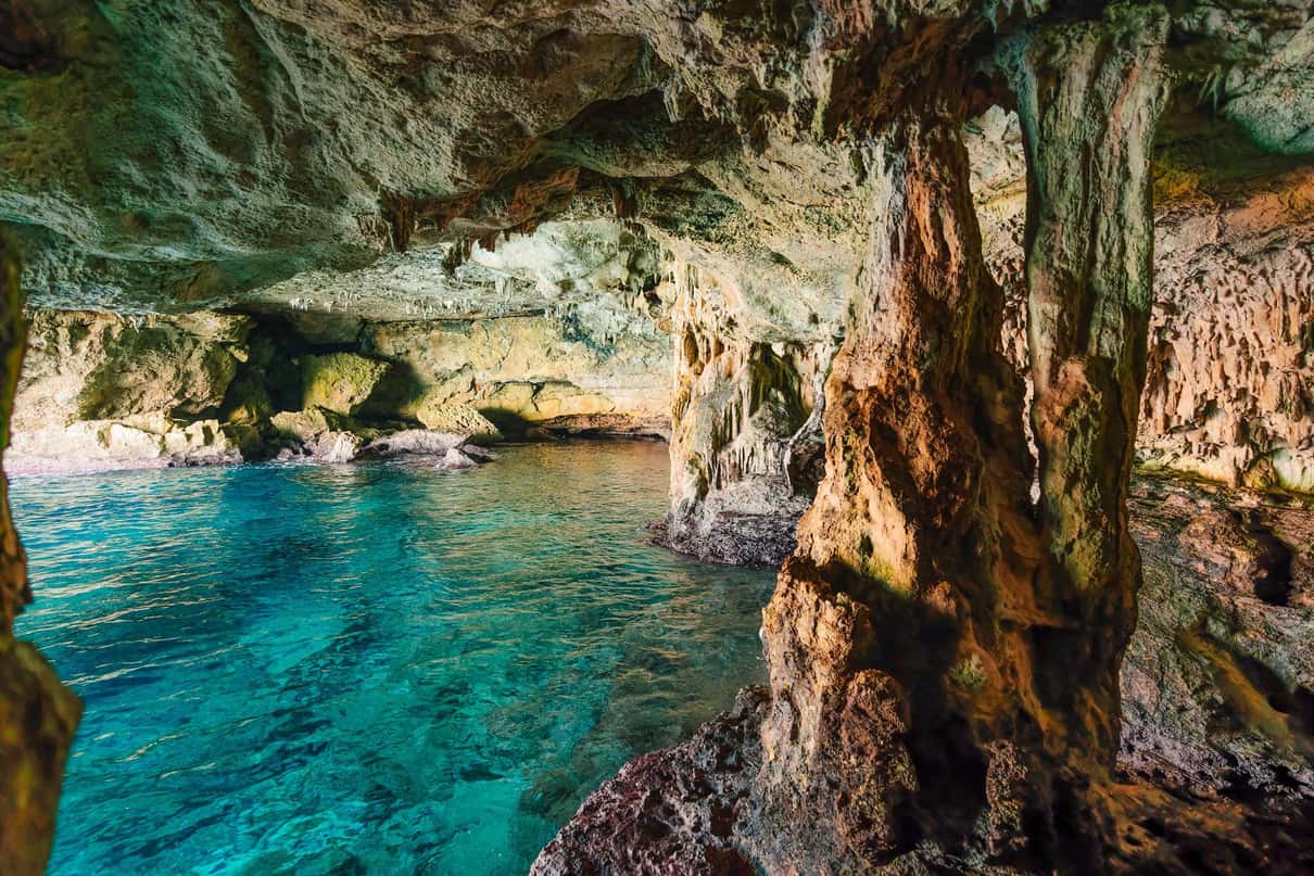 Inside a sea cave with crystal-clear waters